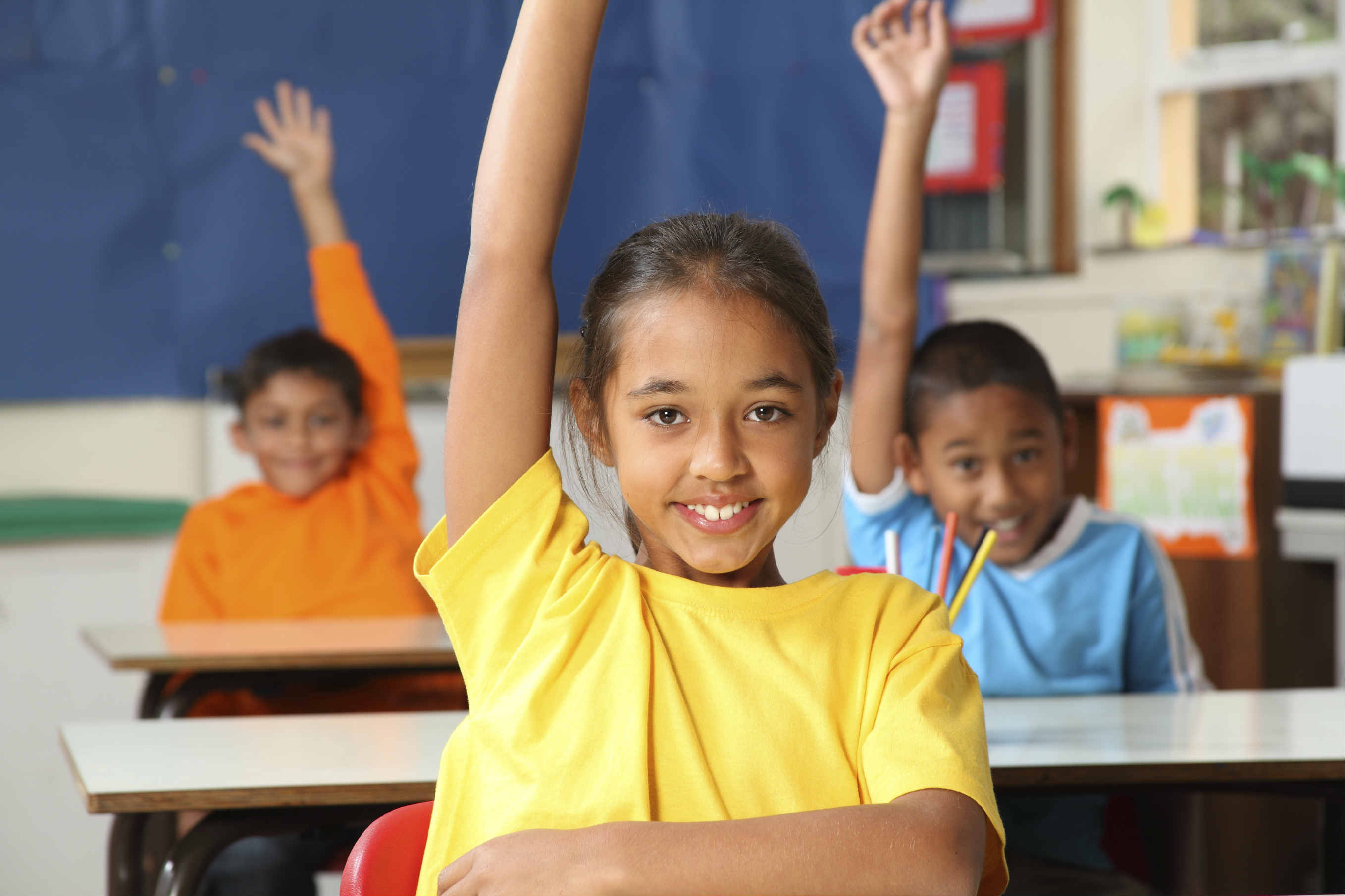 Kindergarten Class Raising Hands